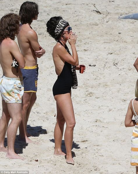 Wow! Actress Radha Mitchell stunned in a backless halterneck one piece swimsuit that displ... Radha Mitchell, Backless Swimsuit, Animal Print Scarf, Kylie Minogue, Signature Look, Scarf Set, Gold Coast, One Piece Swimsuit, Tights