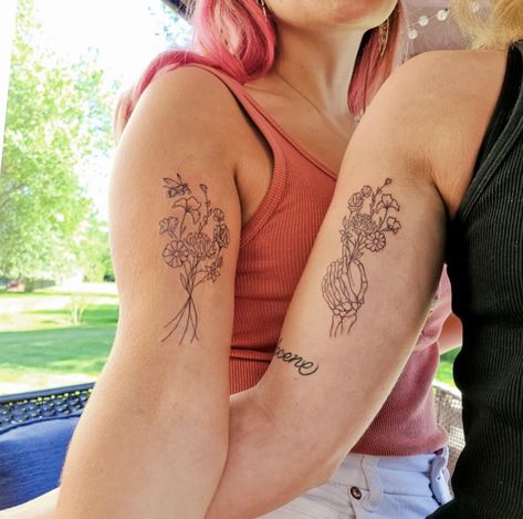 Bee And Flower Matching Tattoo, Skeleton Hand Tattoos Women With Flowers, Skeleton Hand Holding Bouquet, Skeleton Holding Flowers Tattoo, Bicep Flower Tattoo, Flower Bicep Tattoo, Skeleton Hand Holding Flower Tattoo, Skeleton With Flowers Tattoo, Tattoos Matching Sister