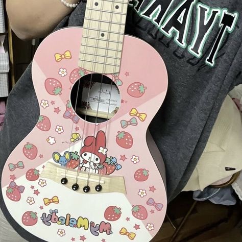 Jungkook Hello Kitty, Aesthetic Instruments, Hello Kitty Guitar, Painted Ukulele, Pink Guitar, Guitar Stickers, Guitar Photos, Guitar Obsession, Cool Electric Guitars