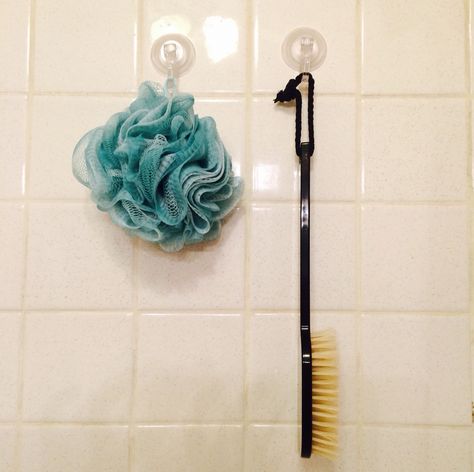 Save shower space with an easy, inexpensive organizer: use suction cup hooks to hang loofahs and poufs!  #DIY #goodidea #organize #bath Suction Cup Hooks, Hanging Ideas, Cup Hooks, Suction Cup, Vacuum Cleaner, Home Appliances, Bath, Shower