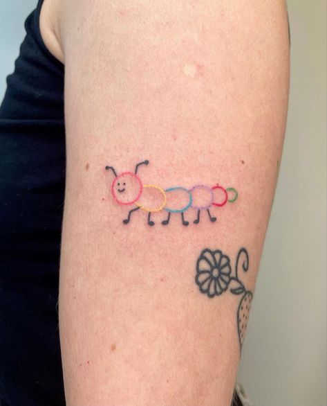 Childcare Tattoo Ideas, Daycare Teacher Tattoo Ideas, Small Caterpillar Tattoo, Tattoo Ideas For Teachers, Educator Tattoos, Doodlebug Tattoo, Cute Caterpillar Tattoo, Preschool Teacher Tattoo Ideas, Tattoo Caterpillar