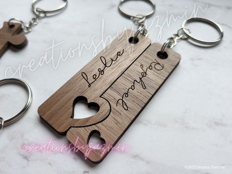 These personalized wooden puzzle keychains make a wonderful gift for your loved one. They are perfect for Valentine's Day, your anniversary, wedding, birthday, or any other special occasion. Each one is laser cut and engraved to order. They are durable and lightweight. Every piece comes with silver colored hardware. Keychains are sold as a set of two connecting pieces. Choose from heart halves, jigsaw pieces, or the rectangular shapes. Due to the natural variation in wood, each piece will have u Song Keychain, Keychain For Him, Puzzle Keychain, Wedding Puzzle, Laser Engraved Leather, Laser Engraved Gifts, Laser Engraved Ideas, Couples Keychains, Wooden Keychain