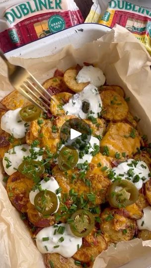 459 reactions · 62 shares | Using Dubliner Red, easy to prep delicious recipe by @lilly_higgins_ 

Totally mouthwatering ‘Dubliner Irish Nachos’ 🍀 

Made with crispy potatoes, delicious Dubliner cheese, bacon bits, fresh chives, and creamy sour cream – all Irish ingredients for a truly magical feast! 

- Simply slice your potatoes, we used 1kg here, dry them well with a tea towel then season with smoked paprika, salt and a drizzle of olive oil. Mix well and spread in a single layer on 2 sheets. 

- Bake at 200C for 20 mins, turning halfway through till golden. 

- Meanwhile spread 1 pack bacon on a tray and bake in the oven till crispy while the potatoes cook. Cool slightly then chop up finely. 

- Grate 1 block of Dubliner mature red from SuperValu.

- Layer 1 tray of potatoes in the bas Dubliner Cheese, Irish Nachos, Dinner This Week, Oil Mix, Crispy Potatoes, Summer Food, Bacon Bits, Fresh Chives, Looks Yummy