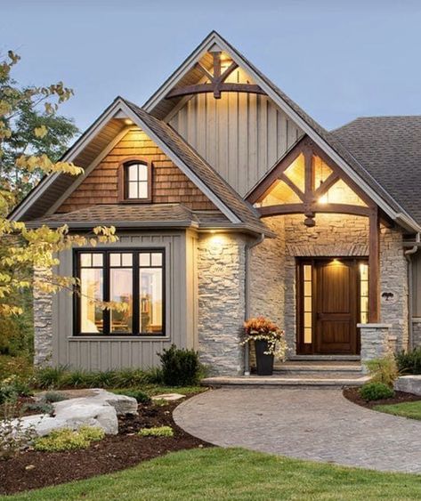 Give the extra mile by trying out rustic colors paired with natural stones as the main attraction of the house. You can experiment with ivory or beige for the upper facade to harmonize with the color of the natural stones.

Source: Pinterest (@One Kindesign)

#RusticHomeColors
#NaturalHomePalette
#RusticExteriorDesign
#CountrysideChic
#EarthyTonesHome
#RusticCharmExteriors
#WarmHomeColors
#NatureInspiredHomes
#RusticHouseIdeas
#CozyHomeExteriors Rustic Exterior House Colors, Rustic House Exterior, Lake Houses Exterior, Rustic Exterior, Exterior House Color, Craftsman Exterior, Brick Exterior House, Modern Farmhouse Exterior, Exterior Remodel