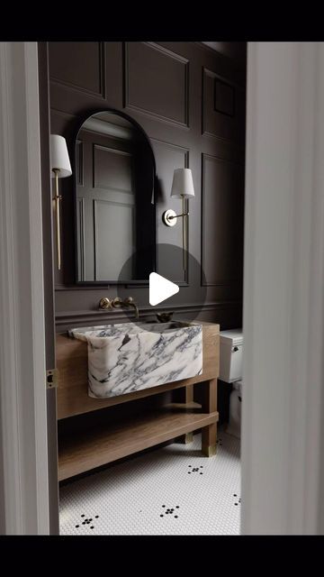 Lisa Clark Design on Instagram: "This space truly takes my breath away and it was only possible by having a dream team who made this all a reality. Every little detail mattered and not a single element didn’t receive the utmost care. To the wall mouldings, hand laid mini tile floor, custom vanity with brass feet and the imported marble sink and faucet from Morocco! Details matter and here is the proof they do! xo, L . . . Design - Lisa Clark Design Contracting - Vertex Construction Millwork - Netley Millwork . . . #IDCOatHome #inmydomaine #mycovetedhome #Beckiowensfeature #houseandhomemag #styleathome #lisaclarkdesign #manitobadesign #canadiandesign #interiordesign #interiorstyling#lindsayhillloves #crappyiphonepicsaremyjam #powderroom #darkgreenroom #pennytile #marblesink #wallfauc Dark Sink Bathroom, Dark Green Rooms, Condo Bathroom, Marble Sink, Bathroom Paint, Bathroom Redesign, Bathroom Guest, Custom Vanity, Brown Walls