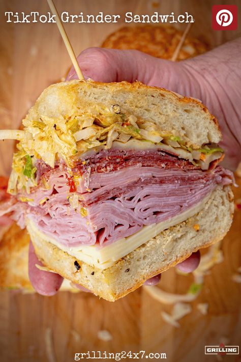 massive Italian cold cut sandwich cut into wedges Tik Tok Grinder Sandwich, Tik Tok Grinder, Italian Grinder Sandwich Recipes, Sub Sandwich Recipes, Turkey Hoagie, Grinder Sandwich Recipe, Hoagie Sandwich, Hoagie Sandwiches, Grinder Sandwich