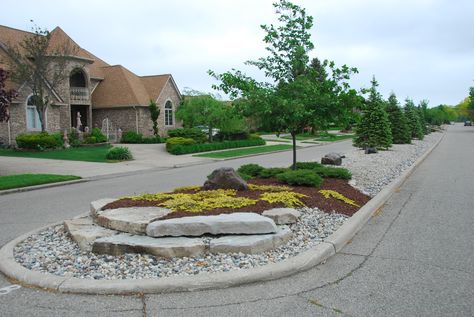 Subdivision Landscape Island. Neighborhood Entry Landscape, Subdivision Landscaping, Median Landscaping, Entrance Plants, Sidewalk Ideas, Landscaping Entrance, Subdivision Entrance, Entry Landscaping, Landscape Island