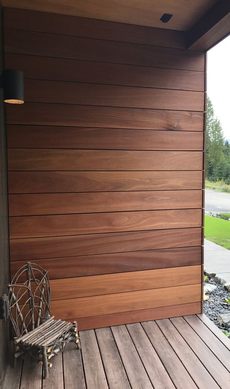 Wood Siding Front Porch, Outdoor Wood Cladding Wall, Outdoor Wood Wall Panels, Wood Wall Exterior House, Outdoor Wood Siding, Exterior Wood Cladding Ideas, Vertical Wood Paneling Exterior, Wood On Exterior Of House, Patio Siding Ideas