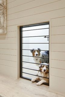 Modern Farmhouse - Farmhouse - Austin - by Classic Constructors LP | Houzz Modern Farmhouse Dog Area, Farmhouse Dog House, Farmhouse Dog Kennel, Dog Room Under The Stairs, Built In Dog Cage Laundry Room, Modern Indoor Dog House, Under Stairs Dog House, White Farmhouse Exterior, Modern Industrial Farmhouse