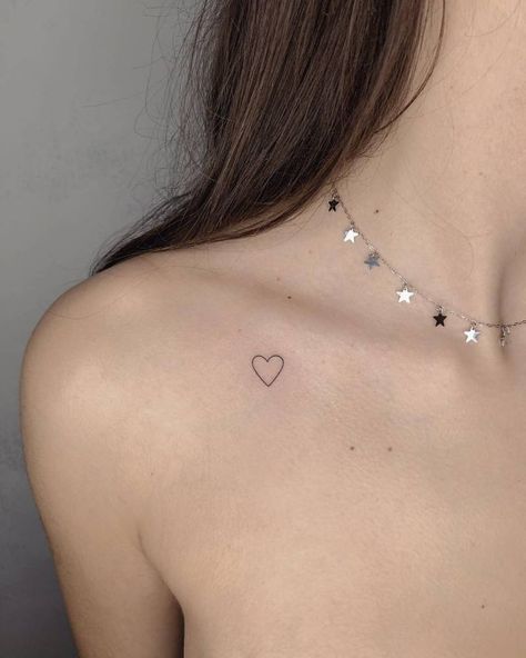 Tiny Heart Tattoo On Collar Bone, Minimalistic Collarbone Tattoo, Cute Clavicle Tattoos For Women, Collar Bone Heart Tattoos For Women, Small Heart Tattoo Collar Bone, Heart On Collarbone Tattoo, Heart Tattoo On Collar Bone Simple, Heart On Collarbone, Tiny Tattoo Collarbone