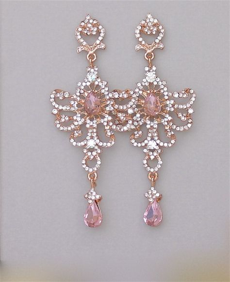 "Stunning blush chandelier earrings designed to add the Wow! factor. Vintage inspired long soft rose gold earrings, are studded with Swarovski clear crystals and sparkling pink blush teardrops. These are light and comfortable earrings, and we are happy to supply a pair of 'comfort back' silicone post pads with your purchase if requested, which help support long earrings. (please leave message at checkout) Measurements: Length: 3.5\" (9 cm) Width -1.5\" (3.8 cm) Nickel free earpost. Set in tarnis Rose Gold Bridal Earrings, Pink Crystal Earrings, Statement Earrings Wedding, Crystal Statement Earrings, Gold Bridal Earrings, Earrings Rose Gold, Rose Gold Bridal, Magical Jewelry, Pink Bridal