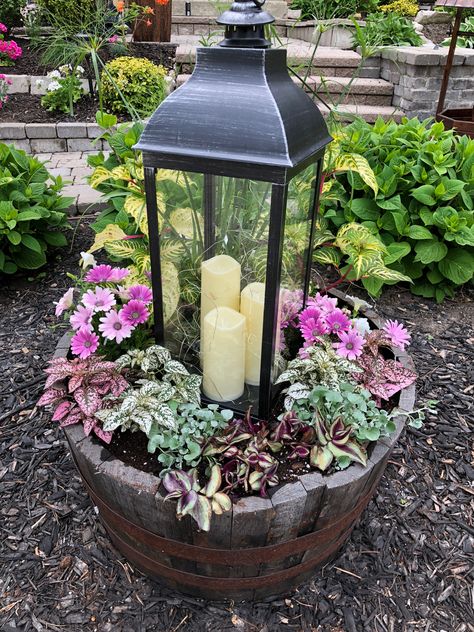 Lantern Planter Ideas, Half Whiskey Barrel Ideas, Wiskey Barrell Ideas Plants, Half Barrel Ideas, Half Barrel Planter Ideas, Planter With Lantern, Whiskey Barrel Garden, Whiskey Barrel Planter Ideas, Whiskey Barrel Ideas