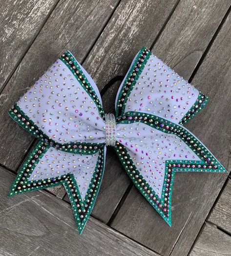 "Team orders of 15 or more bows can take longer to ship.  please read my shop announcement for updated shipping times. made on 3\" grasgrain ribbon and spandex. all of my bows measure approximately 7\"x7\". i only use large, metal free nylon elastices that do not snap-ever! all of my bows are finished with a custom made rhinestone center. -packaged and shipped in a box to ensure it arrives in perfect condition. team orders ship free, if you would like to place a team order just message me and i All Star Cheer Bows, Cheer Bow Diy, Cheer Bow Ideas, Cheer Base, Cheerleader Girls, Cheer Bows Diy, Black Cheerleaders, Competition Bows, Cheer Banquet