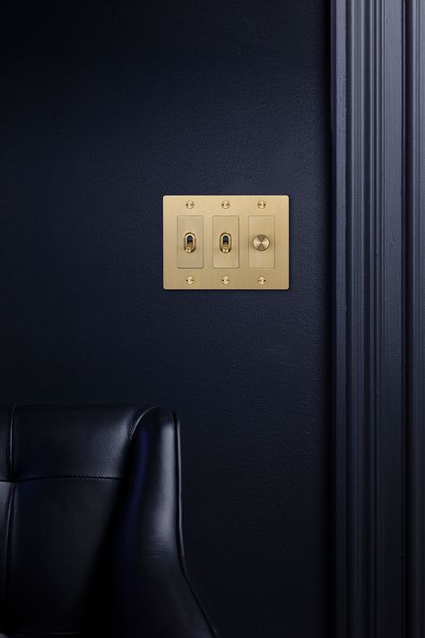 Matching light switches and dimmers in solid metal is an easy way to upgrade interiors. Buster + Punch's iconic light switches and dimmers are available in steel, brass, smoked bronze and black and form the base of your interior's detailing. Now available with or without our subtle etched logo. Light Switch On Side Of Cabinet, Designer Light Switches, Light Switches And Sockets, Closet Bar, Multi Pendant, Cabinet Hardware Pulls, Brass Plate, Light Switches, Bathroom Outdoor