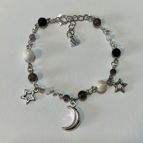 ☆ Ig & Depop: Seek uNeek ☆ handmade ☆ materials: alloy metal, plastic, artificial crystal ☆ freebies every order ☆ more info on store post #moon #stars #beaded #bracelet #handmade #smallbusiness #beadedbracelet #luna Bracelet Ideas Metal, Moon Bracelet Aesthetic, Moon Charm Bracelet, Star Beads Bracelet, Metal Beaded Bracelets, Moon Bead Bracelet, Moon Beaded Bracelet, Small Beads Bracelet, Star Beaded Bracelet