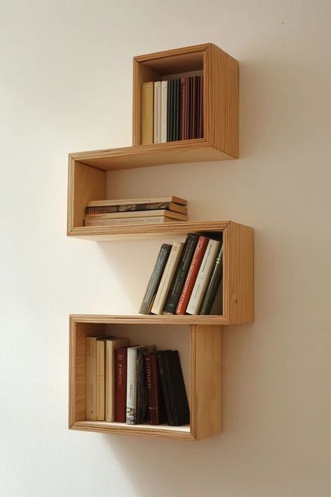 "Transform your space with sleek Floating Bookshelves! 📚🛠️ Ideal for creating storage in compact rooms. 🌿✨ #BookshelfInspo #SmallSpaceDecor #DIYHome" Book Shelf Bedroom Small Spaces, Floating Shelf Books, Wooden Book Shelves On Wall, Short Book Shelf Ideas, Wooden Floating Bookshelves, Small Bookshelf On Wall, Bookshelves Small Space, Above Desk Shelves, Small Wall Bookshelf Ideas