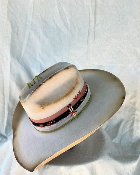 “Cow Belle” Custom burned and banded silver belly cowboy hat adorned with hand sewn details, matches, leather, silver concho, multiple fabrics and turkey feathers. Very good quality cashmere wool felt hat. One of a kind. Size: 7 $275 https://theroguecowpoke.etsy.com/listing/1807938475 Turkey Feathers, Felt Hat, Hats For Sale, Leather Silver, Cashmere Wool, Cowboy Hat, Custom Hats, Hand Sewn, Wool Felt