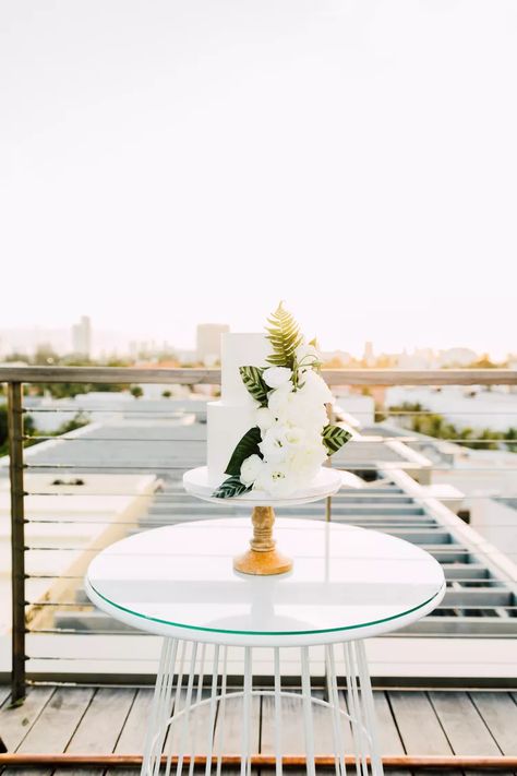 Cake With Palm Leaves, Wedding Cakes Two Tier, Simple Wedding Cakes, Rooftop Reception, Tropical Wedding Cake, Fair Photography, White Buttercream, Two Tier Cake, Floral Wedding Cakes