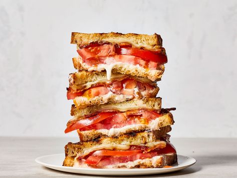 Ultimate Grilled Tomato Sandwiches | Toasty bread, juicy tomatoes, melty cheese, and smoky bacon—what’s not to love? These decadent grilled sandwiches are the perfect place to put your ripe summer tomatoes, and pair beautifully with a light, refreshing summer soup. While you could certainly prepare them in a skillet on the stove, going to the grill takes these superb summer sandwiches to the next level. Tomato Sandwich Recipes, Heirloom Tomato Recipes, Tomato Sandwiches, Grilled Sandwiches, Grill Sandwich, Summer Sandwiches, Cheese And Tomato, Summer Soup, Tomato Sandwich