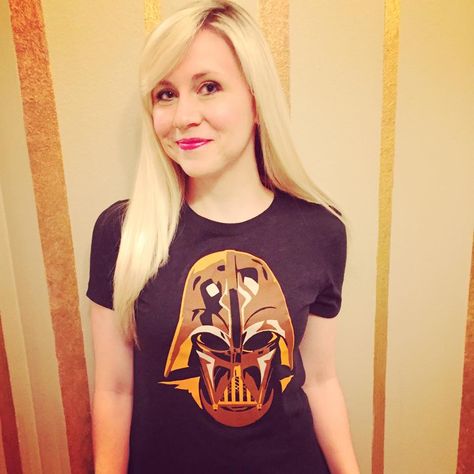 Ashley Eckstein the voice of Ahsoka Tano wearing the shirt " Visions Of Ahsoka " designed by Dave Filoni to honor their appearance on Star Wars Rebels as former master and apprentice during the Clone Wars. Master And Apprentice, Ashley Eckstein, Dave Filoni, Star Wars Fashion, Star Wars Books, Star Wars Ahsoka, The Clone Wars, Her Universe, Star Wars Women