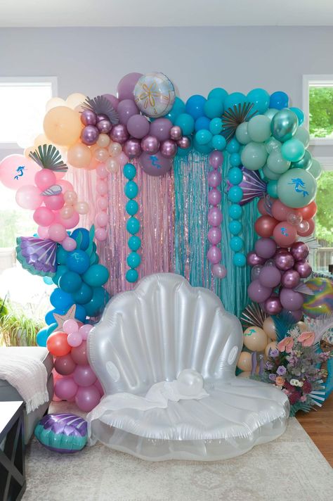 Sophia's Magical Mermaid 4th Birthday Pool Party | CatchMyParty.com Mermaid Birthday Party Ideas, Birthday Pool Party, Mermaid Pool Parties, Ariel Birthday Party, Ariel Party, Mermaid Invitation, Mermaid Birthday Decorations, Princess Birthday Party Decorations, Mermaid Birthday Party Decorations