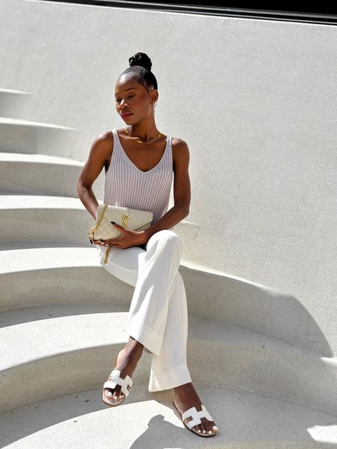 Chic Ensemble: YSL BAG & Hermes Oran Sandal | Black Girl in Luxury | Quiet Luxury | Stealth wealth elevate your fashion game | Sofia Richie Style | Jasmine Tookes Style | Classic Style | timeless Elegance | style inspo | Luxury Style inspired | effortless style | How to get quiet luxury looks | understated style & fashion | neutral tones | white aesthetics | Aesthetics | white wardrobe | black woman | black girl | london style | Stylish | succession accessories | oran sandals | White Hermes Oran Sandals Outfit, Luxury Aesthetic Black Women, Hermes Oran Sandals Outfit, Nicole Core, Jasmine Tookes Style, Zara Earrings, Stealth Wealth, White Aesthetics, September Outfits