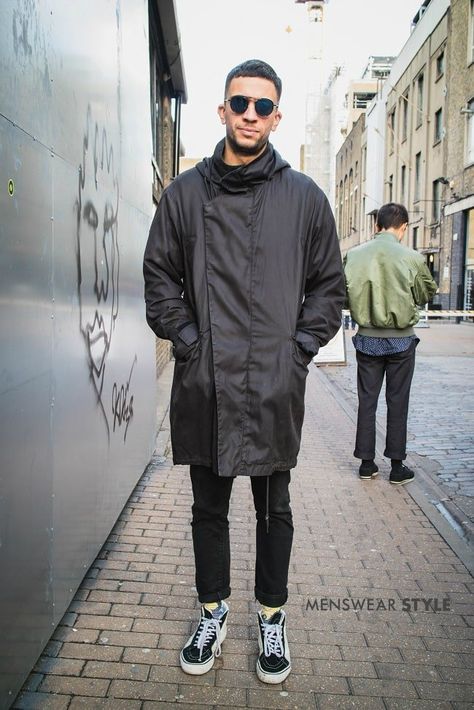 This is Ben on the streets of London in 2019 wearing Vans Trainers, Slim Black Jeans, Black Raincoat, and Round Frame Sunglasses. Black Raincoat Outfit Men, Raincoat Outfit Men, Black Raincoat Outfit, Vans Trainers, Raincoat Outfit, Black Raincoat, Modern Mens Fashion, Streets Of London, London Photographer