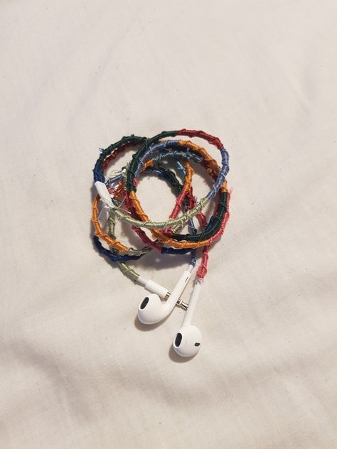 Earbud Wrap Diy Embroidery Thread, Friendship Bracelet Headphones, Headphone Wire Wrap, Wire Earbuds Aesthetic, Decorated Wired Earphones, Wired Headphones Decorate, Wrapped Earphones, Wire Earphones, Wrapped Earbuds