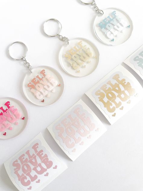 Personalized acrylic keychains with inspiring messages. Perfect for birthdays, graduations, or any special occasion. #acrylickeychains #bekind . #Acrylic_Circle_Keychain_Ideas #Resin_Keychains_Ideas #Acrylic_Keychain_Ideas #Cricut_Personalized_Gifts Self Love Birthday, Cricut Personalized Gifts, Valentines Keychain, Acrylic Keychain Ideas, Valentine Keychain, Acrylic Sticker, Acrylic Rounds, Stationery Store Design, Valentines Surprise