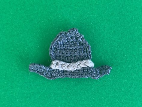 Get this free crochet pattern of a crochet cowboy hat. This and many other crochet patterns are available on my website, Kerri’s Crochet #FreeCrochetPatterns #CrochetCowboyHat Crochet Cowboy Boot Applique, Crochet Cowboy Hat Applique, Crochet Cowboy Hat Pattern, Crochet Cowboy Hat, Crochet Cowboy Boots, Crochet Cowboy Hats, Cowboy Hat Pattern, Crochet Starfish, Crocheted Cow Pattern