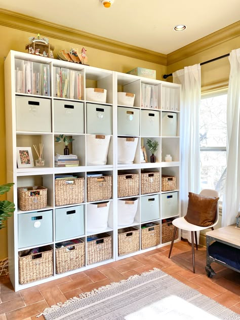 Craft room organization by Graceful Spaces Organizing. Storage Room And Office, Craft Room Library Combo, Multipurpose Room Organization, Ikea Billy Bookcase Craft Room Organization, Office Storage Shelves, Ikea Craft Storage Hacks, Craft Shelf Organization Ideas, Cube Storage Craft Room, Cube Storage Craft Organization