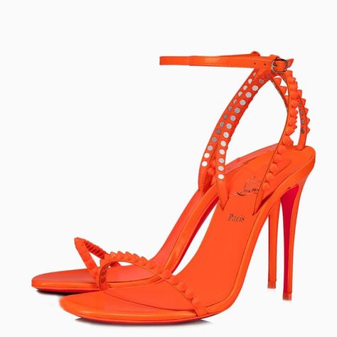 High sandals by Christian Louboutin fluo orange patent leather, featuring high stiletto heel, ankle strap with buckle closure, all-over spikes embellishment, framed with signature red and branded insole.Gender: WomenMaterial: 100% Leather / Leather soleColor: OrangeMade in: ITProduct ID: 1230581LE/M_LOUBO-O285*Import tax/duty will be calculated at checkout (If applicable) Red Bottom Heels, Orange Tone, High Sandals, Orange Neon, Ankle Strap Sandals Heels, So Me, Louboutin Heels, Tone On Tone, Red Bottoms