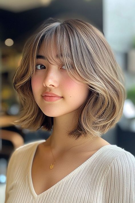 45 Chic Layered Bob Haircuts : Soft Ash Blonde Bob with Wispy Bangs Asian Blonde Bob, Soft Ash Blonde, Bob With Wispy Bangs, Asian Blonde, Ash Blonde Bob, Cool Ash Blonde, Chin Length Cuts, Angled Bobs, Brunette Bob