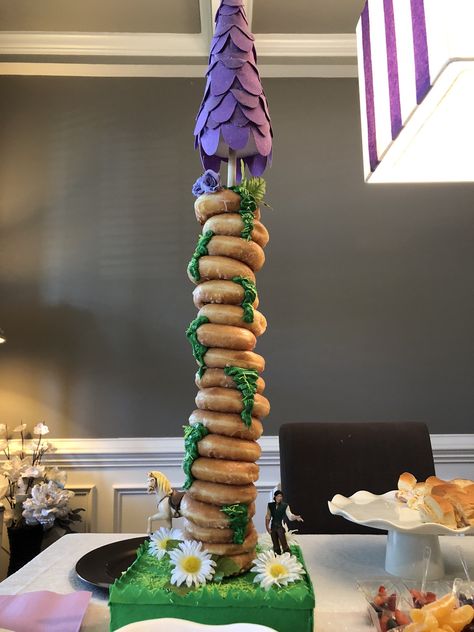 Donut tower, Tangled Tangled Snack Ideas, Tangled Candy Table, Rapunzel Themed Snacks, Rapunzel Donut Tower, Tangled Dessert Table, Tangled Themed Desserts, Tangled Theme Food, Rapunzel Dessert Table, Tangled Sweet Sixteen