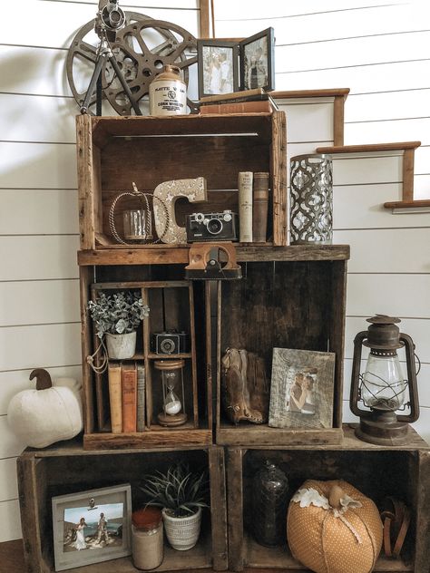 Crates For Bookshelves, Antique Crate Ideas, Antique Crate Decor, Decorating With Old Wooden Crates, Old Wooden Crate Ideas, Vintage Crate Bookshelf, Western Primitive Decor, Decorating With Old Wooden Boxes, Old Crates Repurposed