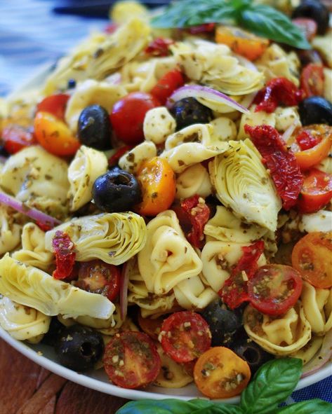 Artichoke Pesto Pasta Salad - southern discourse Pasta Salad Artichoke, Salad Artichoke Hearts, Pasta Salad With Artichoke Hearts, Pasta Salad With Artichokes, Salad Artichoke, Salad With Artichoke Hearts, Salad With Artichokes, Artichoke Pasta Salad, Artichoke Pesto