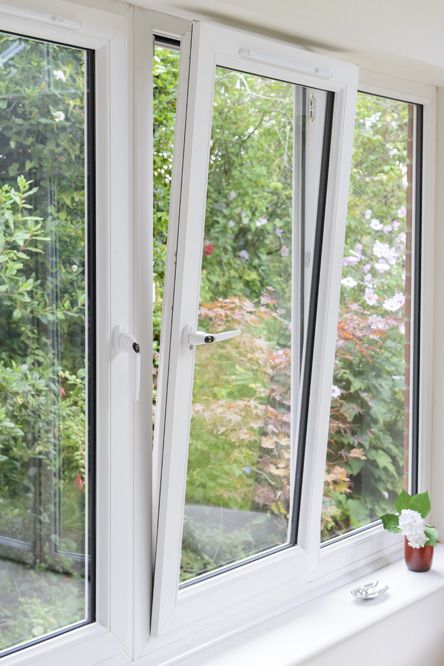 White uPVC Tilt & Turn window in the tilt position Pvc Windows Design House, Tilt Turn Windows, Pvc Windows Ideas, White Pvc Windows, White Aluminium Windows, Upvc French Windows, Windows Aluminium, Double Glazing Windows, Aluminium French Windows