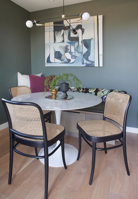 Dining nook in a penthouse condo featuring Hoffman side chairs, a Saarinen Tulip Table and artwork by Laina Terpstra. Designed by The Residency Bureau. Pacific Northwest Interior, Hoffman Chair, Modern Mediterranean Home, Seattle Interior Design, Saarinen Tulip Table, City Penthouse, Modern Penthouse, Nook Table, Tulip Dining Table