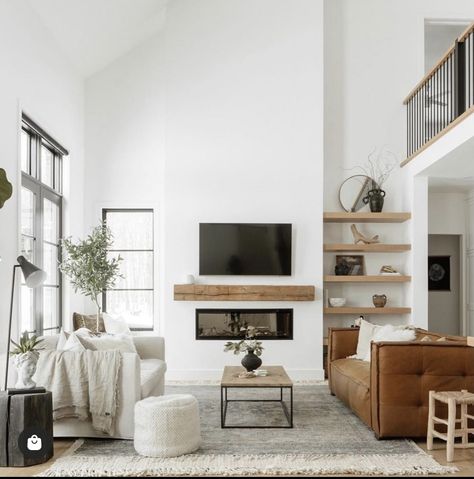 Modern Staircase Chandelier, Wall Shelves Living Room, Brown Leather Couch, Staircase Chandelier, Modern Staircase, Leather Couch, Living Room Inspo, Couches Living Room, Living Room Inspiration