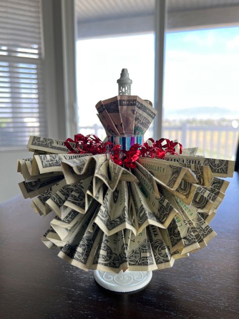 Another great idea to give cash for gift. Money never go wrong… Everyone happy to get it Quinceanera Money Gift Ideas, Design Money For Gift, Wine Bottle Money Dress, Fun Ways To Give Money As A Gift Wedding, Bridal Shower Money Gift Ideas, Money Flower Bouquet Dollar Bills, Wedding Money Gift Ideas, Money Bouquets, Money Birthday Gift Ideas