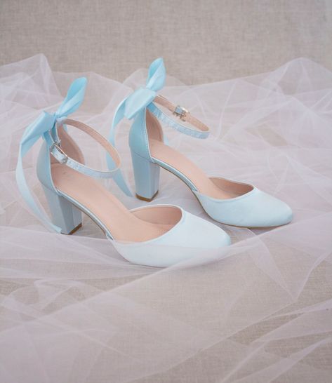 Satin block heel with added back bow to highlight your look for any occasion. Perfect wear for fall or summer wedding, bridesmaids, bridal party, holiday party, and any special occasions.  DETAILS: HEEL HEIGHT: 3 inches COLORS AVAILABLE: White, Ivory, Light Blue, Champagne, Burgundy, and Navy UPPER: Synthetic upper and lining MATERIALS: Mandmade outsole STYLE NAME: SARAH Not sure of which size to purchase? Shoes measurements are as follow: (Please note measurements taken the length of inside of Cinderella Quinceanera Heels, Light Blue Block Heels, Blue Heels For Wedding, Light Blue Prom Shoes, Baby Blue Wedding Shoes, Blue Prom Shoes, Light Blue Sweet 16, Quinceanera Heels, Light Blue Wedding Shoes