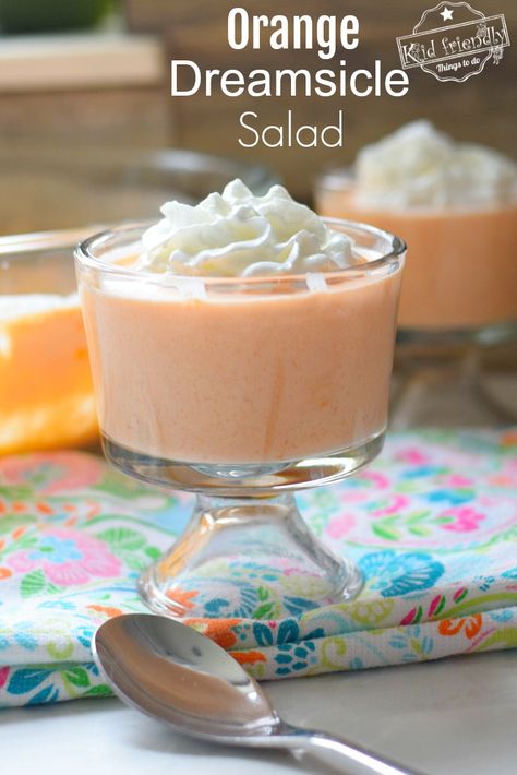 Orange Dreamsicle Jello Salad Recipe - Great Dessert to Feed a Crowd. A classic old school recipe that is perfect for holidays, summer picnics, and backyard get-togethers! #dessertforacrowd #jellodessert #jellosaladrecipe #dessert #creamsicle #jello #salad #mandarin #orange Orange Dreamsicle Jello, Dessert To Feed A Crowd, Creamsicle Jello, Orange Jello Salads, Jello Mold Recipes, Jello Dessert Recipes, Orange Dreamsicle, Jello Desserts, Jello Salad