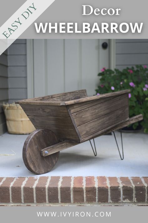 Diy Rustic Wheelbarrow, Diy Wheelbarrow How To Build, Diy Wooden Wheelbarrow, Money Making Wood Projects, Wheelbarrow Planter Ideas, Diy Wheelbarrow, Wheelbarrow Decor, Rustic Wheelbarrows, Wooden Wheelbarrow