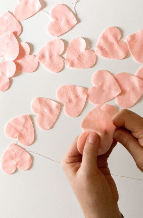 Fun Blush Tassel Garland, Felt Heart Garland, and Wood Bead Garland to Spruce up your Home Decor for Valentine’s and Galentine’sI always have trouble finding seasonal or holiday decor that I don’t find tacky or overwhelming. Most of the time, I prefer decor that is a little more simple, a little more versatile, and timeless. I feel like these Valentine’s Day Garlands fit the bill!With that being said, I like to go all out for parties! This will be the first year in a while that I am no Valentine’s Day Garland, Diy Accent Wall, Ribbon Garland, Apothecary Cabinet, Linen Closet Organization, Moss Balls, Heart Garland, Spruce Up Your Home, Felt Heart