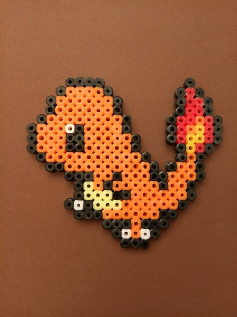 Charmander Perler beads creation by mariqlz.deviantart.com on @DeviantArt Perler Beads Charmander, Charmander Perler Beads, Charmander Perler, Pokémon Perler Beads, Perler Beads Disney, Perler Beads Pokemon, Pokemon Perler Bead Patterns, Hama Beads Pokemon, Mini Hama Beads