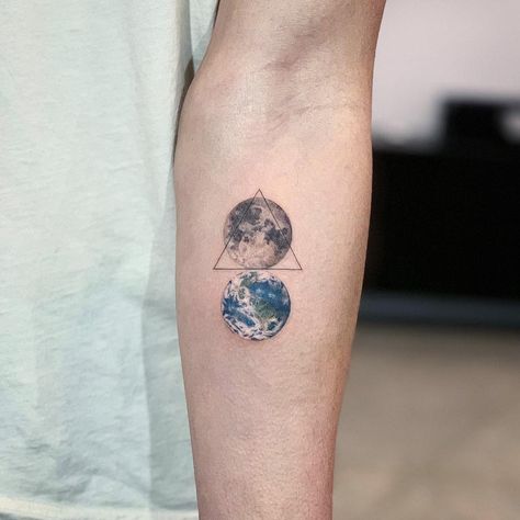 Moon and Earth tattoo by Dragon Ink tattooed on the left forearm Earth And Moon Tattoo, Earthy Tattoos, Earth Tattoo, Tattoo Filler, Moon Tattoo Designs, Famous Tattoos, Tattoos Geometric, Baby Tattoos, Tattoo Outline