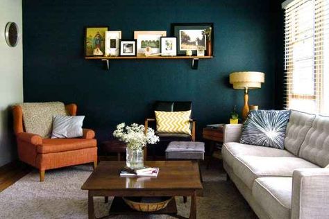 An accent wall can do a lot to refresh a smaller room. | 10 Easy Ways To Transform Your Space With Color Paneling Walls, Navy Accent Walls, Teal Accent Walls, New Paint Colors, Accent Walls In Living Room, Wall Bed, Wood Panel Walls, Home Decor Tips, Interior Paint