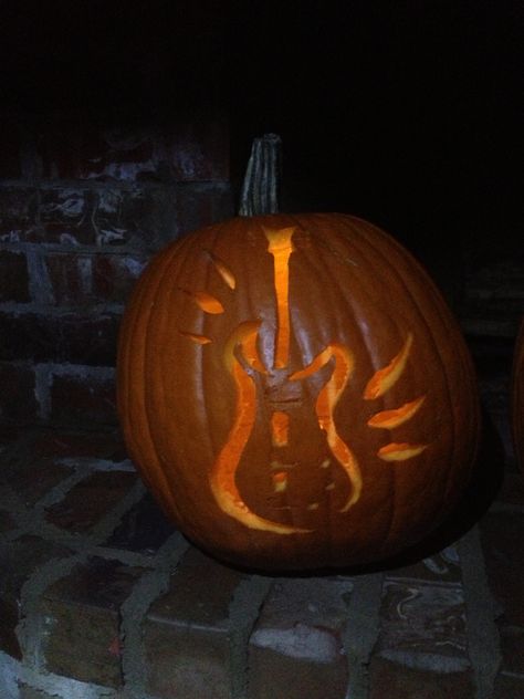 Guitar Jack-o-Lantern Halloween pumpkin carving Rock N Roll Pumpkin Carving, Guitar Pumpkin Carving, Cowboy Pumpkin Carving, Best Pumpkin Carving, Cowboy Pumpkin, Halloween Pumpkin Stencils, Halloween Pumpkin Carving, Pumpkin Stencils, 90s Fashion Outfits Hip Hop Party