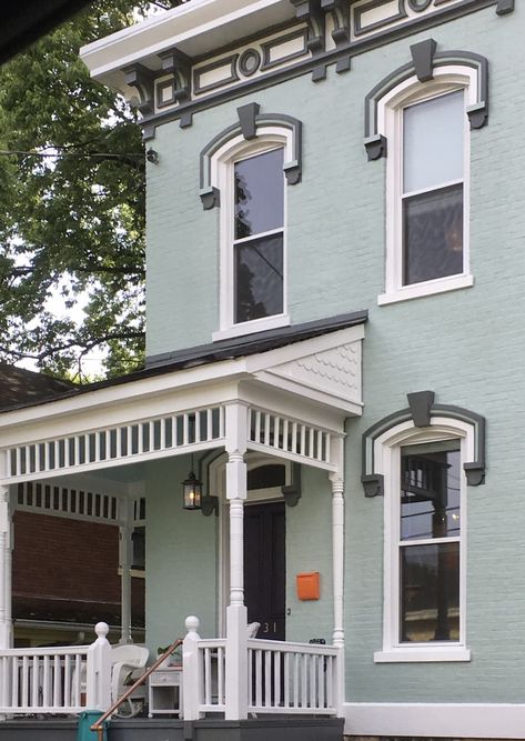 Mint green exterior of two story house with white porch Mint Color House Exterior, Light Teal Exterior House Paint, Mint Exterior House Colors, Pale Green House Exterior, Mint Green House Exterior Color Schemes, Mint House Exterior, Mint Green Exterior House Colors, Mint Green House Exterior, Blue Green House Exterior