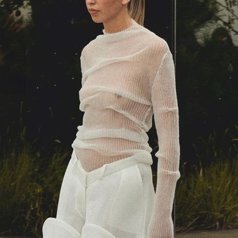 Tess van Zalinge on Instagram: "Monochromatic white. A tech plissé long-sleeve design, knitted by hand featuring drape details worn with an oversized v-shape pantalon crafted from upcycled Balenciaga neoprene material, typically reserved for their sneakers. Discover ‘klavertje drie’ collection via the link in bio.⁣ Captured by @simone_frank Model @teddieoorthuys" Worn Out Clothing, Neoprene Fashion, Western Inspired Outfits, Contemporary Dance Costumes, Upcycling Fashion, Long Outfit, Upcycled Fashion, Knit Outfit, Knit Set